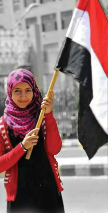 yemenli küçük kız yemen bayrağı ile  